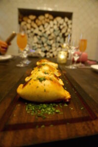 Empanada De Espinaca: Savory Pastry, Swiss Chard, Sardo Cheese, Roasted Onions